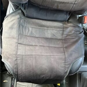 Two front seat, seat covers with storage pockets all around.